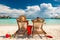 Couple in loungers on beach at Maldives