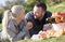 Couple lounging at picnic outdoors