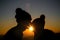 Couple in love backlight silhouette on hill