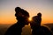 Couple in love backlight silhouette on hill