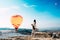 Couple in love among balloons. A guy proposes to a girl. Couple in love in Pamukkale. Couple in Turkey. Honeymoon in the mountains