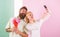 Couple in love bouquet dating celebrate anniversary relations. Sharing happy selfie. Taking selfie photo. Capturing