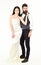 Couple in love, bride and groom in elegant clothes, white background. Wedding concept. Bearded hipster with attractive