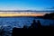 Couple in love contemplate the Sunset in the Albufera of Valencia