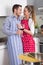 Couple in love cooking together in the kitchen and have fun - re