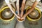 A couple in love creates a joint cup in a pottery workshop. Potter making ceramic pot on the pottery wheel