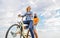 Couple in love date cycling. Couple with bicycle romantic date sky background. Let her be leader. Psychology of