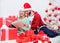 Couple in love enjoy christmas. Family cuddle drink champagne near christmas tree while looking family photo album