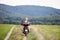 Couple in love enjoying a motorbike ride in countryside.