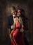 Couple in Love, Fashion Woman and Man, Girl with Red Band on Eyes Charming Boyfriend in Suit, Glamor Model Portrait