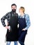 Couple in love getting ready for barbecue. Picnic and barbecue. Man bearded guy and girl ready for barbecue white