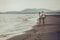 Couple in love having fun dating on beach.