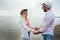 Couple in love having fun dating on beach