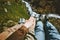 Couple in love holding hands relaxing together on mountain summit