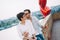 Couple in love holding red baloons hearts on valentine day