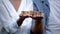 Couple in love holding trust word on wooden cubes on palms, family relations