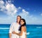 Couple in love hug in blue sea vacation