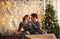 Couple in love husband and wife in hug together at home in Christmas