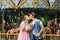 A couple in love kissing in soap bubbles in amusement parks