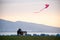 Couple in love. looking at view of romantic seaside and Flying Kite