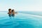 Couple In Love In Luxury Resort Pool On Romantic Summer Vacation