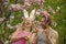 Couple in love in magnolia flower, spring. family