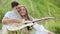 Couple In Love On Nature, Man Teaching Woman Playing In Guitar