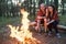 Couple love nature picnic bonfire forest concept.