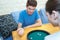 couple in love playing ludo board game