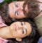 Couple in love relaxing lay at meadow close up. Hipster bearded man and girl happy carefree enjoy relax. Man unshaven