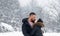 Couple in love, sensual lovers kissing and embracing in winter outdoor.