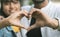 Couple in love showing heart with their hands - Concept of happy couple relationship and togetherness