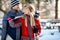 Couple in love on skiing on mountain