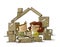 A couple in love are among some cardboard boxes that form the shape of a house. home buying concept. isolated