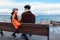 Couple in love. Street shot. Lake and mountains background