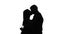 Couple in love. Sweet kiss. Silhouette. White