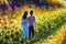Couple in love walk flower road in cosmos to their dream