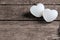 Couple of love white hearts on wooden dark