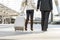 Couple lover business journey with luggage in urban city. Love and travel journey concept