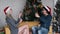 Couple lover play fireworks party together in the room with yellow sofa and Christmas tree