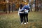 A couple of lovers run through the autumn park and have wonderful moments of happiness and joy.