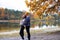 A couple of lovers run through the autumn park and have wonderful moments of happiness and joy.