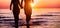 Couple of lovers walking inside water on tropical beach in summer vacation at sunset - Young people enjpying holidays - Love,