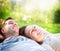 Couple Lying on Grass Outdoor