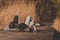 Couple lying on lake docks