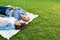 Couple lying in park