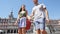 Couple in Madrid holding hands dating in Spain on Plaza Mayor