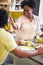 Couple making breakfast at home. Loving couple enjoying in morning