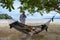 couple man and woman on the beach in Phuket Thailand, Nai Yang beach with hidden Island in front