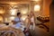 A couple man and woman drinking wine in the old cave room of Cappadocia